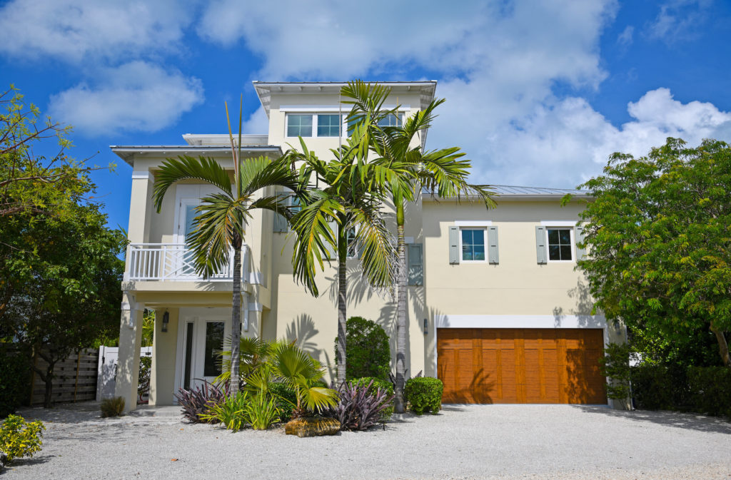 Large,beach,house,with,deck,,garage,and,beautiful,landscaping,including